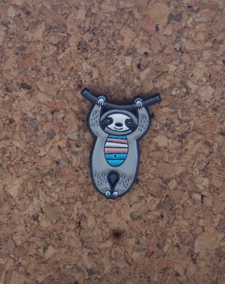 Make a Statement with Our Adorable Transgender Sloth Enamel Pin!